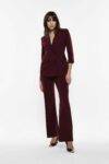 Pantaloni flare con inserto in raso Imperial marsala