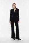 Pantaloni flare con inserto in raso Imperial marsala