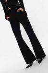 Pantaloni flare con inserto in raso Imperial marsala