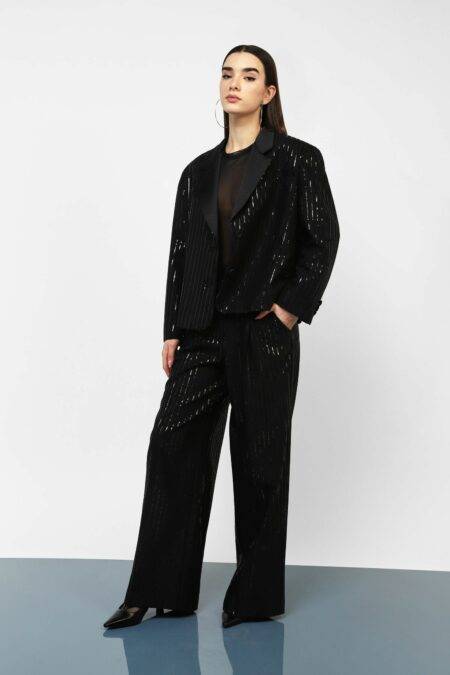 Pantaloni gamba larga con paillettes Dixie