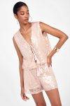 Gilet con lustrini e dettagli Dixie