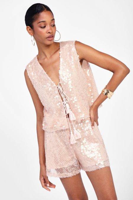 Gilet con lustrini e dettagli Dixie