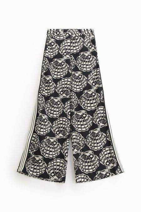 Pantaloni palazzo con motivi grafici