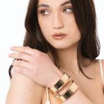 Bracciale rigido in metallo lucido forato Mya Accessories