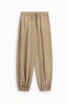 Pantaloni jogging ampi con polsini elastici Dixie