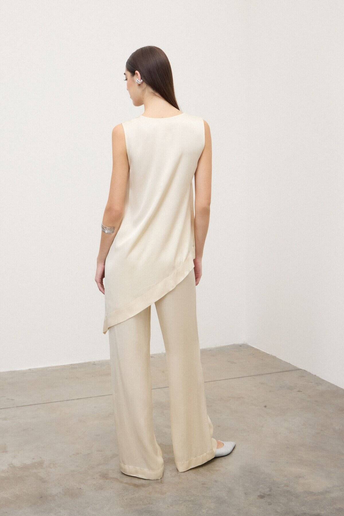 Top con taglio asimmetrico Ottod’Ame 1 Top con taglio asimmetrico Ottod'Ame 1